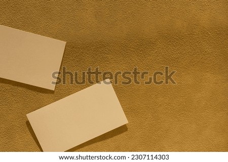 Blank paper card sheets on tan beige background. Social media, web branding template with copy space, clipping path