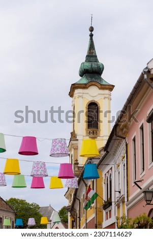Street decoration of plenty colorful lampshades in old town of Szentendre, Hungary