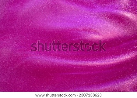 Stains and overflows of silver particles with magenta tints. Beautiful flying shiny particles on a pink background. Magic Galaxy of white dust particles in crimson fluid. Royalty-Free Stock Photo #2307138623