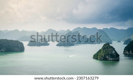 Beautiful limestone karst islands of Ha Long Bay in Vietnam. View from Ti-Top Island Royalty-Free Stock Photo #2307163279