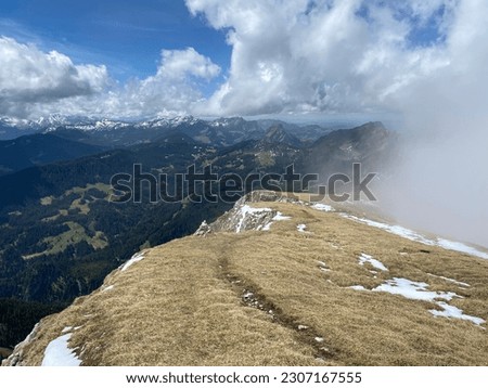 Alpine spring atmosphere with the last remnants of winter and snow on the slopes of the Pilatus mountain range, Alpnach - Canton of Obwalden, Switzerland (Kanton Obwald, Schweiz)