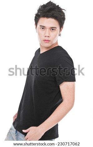 Studio picture of a young and handsome man posing