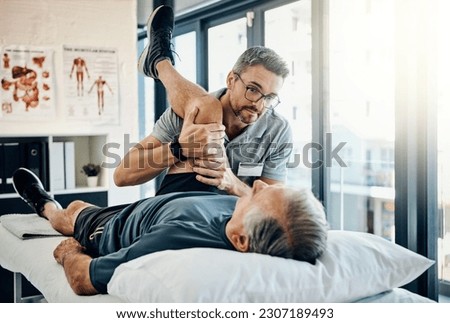 Stretching legs, help and a physiotherapist with a man for wellness and recovery support. Rehabilitation, health and a male doctor helping an elderly person with physiotherapy on body muscle Royalty-Free Stock Photo #2307189493