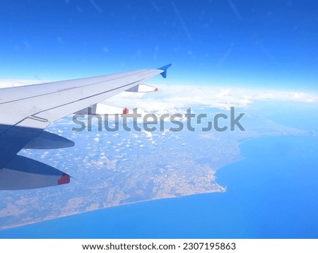 Flying across the Italian coastline