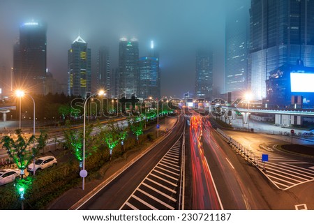 the light trails on the modern building background in shanghai chin
