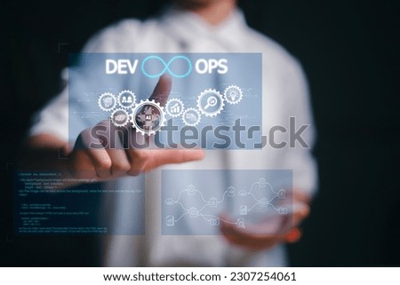 Agile programming and DevOps concept. Engineer working the virtual screen. IT operations, high software quality, and software development. Royalty-Free Stock Photo #2307254061
