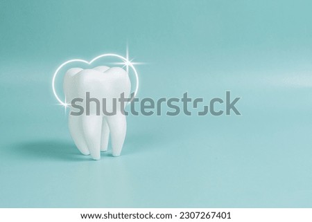 Healthy tooth on a blue background. Teeth whitening concept. Teeth whitening procedure poster, dental health and oral hygiene for dentistry design. 