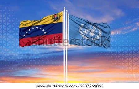 Venezuela and United Nations two flags on flagpoles and blue cloudy sky . Diplomacy concept, international relations
