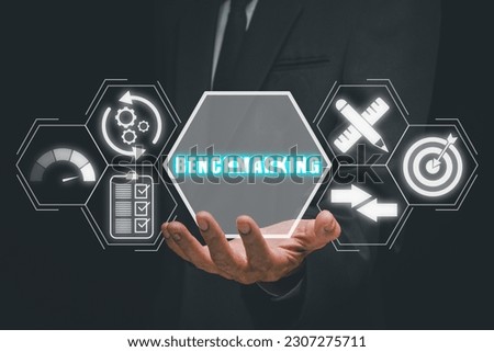 Benchmarking concept, Businessman hand holding benchmarking icon on virtual screen. Royalty-Free Stock Photo #2307275711