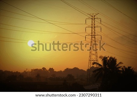 The sun rises (Matahari terbit). it's like clinging to high-voltage power lines.