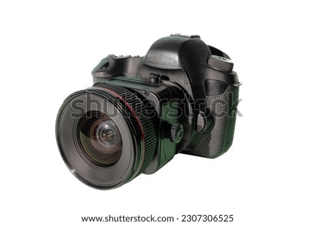 A DSLR camera and tiltshift lens left side front on. Ready for use in tutorials and editorials associated with photography, camera equipment, technology and photography history.