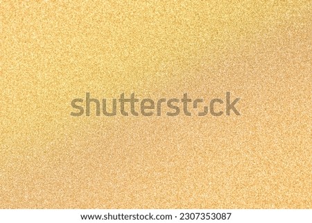 Golden silver sparkle glitter backdrop. 
Bokeh for color yellow light shine christmas and  happy new year. 
Abstract gold  light confetti blur  background.
top view