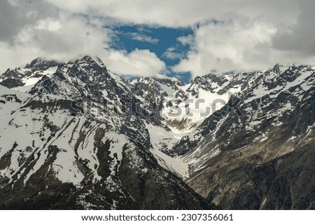 View of La Blanche and Mont Pelvoux from the climb to the Vallou Royalty-Free Stock Photo #2307356061