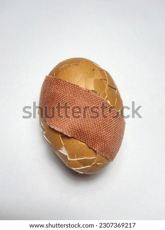 Plasters that are pasted on chicken eggs to cover the cracks of the eggshell. And even though it is pasted But still can't cover or make the chicken eggs heal