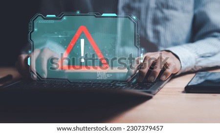Programmer and virtual icons, exclamation mark ,alarm,computer virus detected ,danger warning concept or information error that should be urgently fixed and repaired ,Notification of security issues