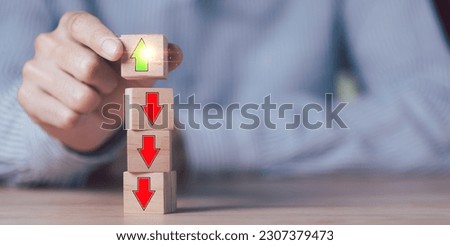 Businessman showing business growth with green arrow icon ,concept of progress in development ,business strategy for goals ,Developing marketing efficiency strategies ,increase in business profits