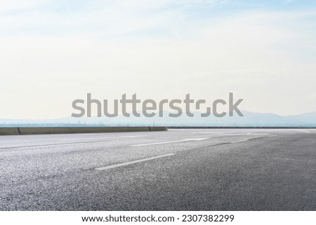 landscape road with clear sky background Royalty-Free Stock Photo #2307382299
