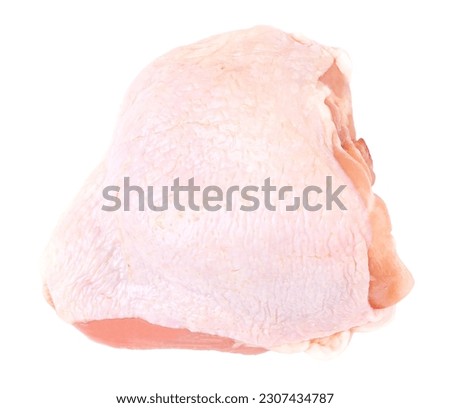 Raw chicken thigh, isolated on white background, close-up