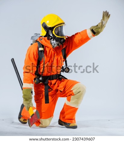 The white background provides a contrast to the ruggedness of the iron axe emphasizing the firefighter's role as a protector and their ability to handle challenging situations.
