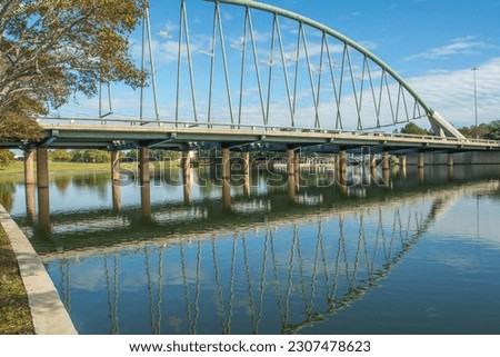 Lake Robbins Drive bridge in in Woodlands Town Center located in Montgomery County, Texas, USA Royalty-Free Stock Photo #2307478623