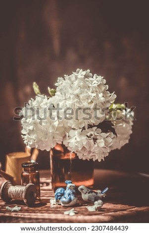 Still life with a bouquet of daisies