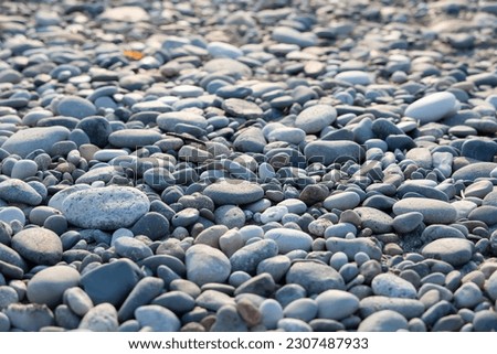 Large rolling sea stones of the sea shore.