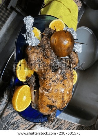 Picture of roast duck with oranges
