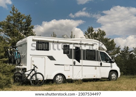 a vacation trip in a motorhome, a rest in a van. Royalty-Free Stock Photo #2307534497