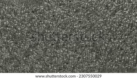 close up, background, texture, large long vertical banner. surface structure black expanded polyethylene, EPE, padding cushioning material for packages. full depth of field. high resolution photo