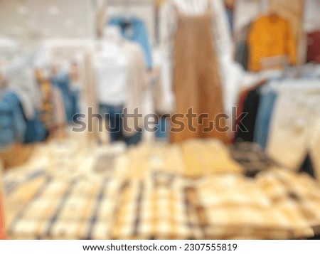 Defocused Abstract Background display of women Apparel in departement store inside modern Shopping Mall or Shopping Center. with vintage tone effect