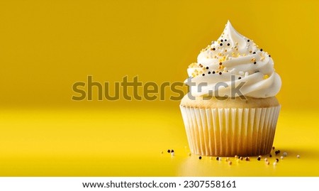Creative food composition. Butter cupcake muffin with cream frosting sprinkles on yellow background. Template for product presentation display. copy text space banner	
