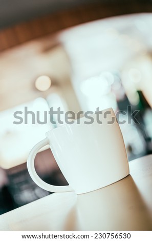 Hot Coffee cup in coffee shop - vintage effect style pictures