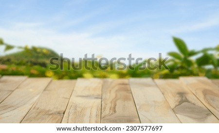 Wooden board on table with shadows, display podium for product mockups 3d trade show display advertising, Natural blurred defocused background 