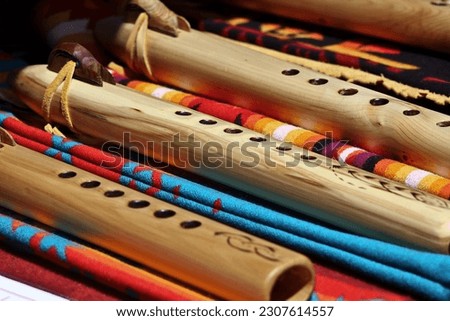 Handmade Indigenous flutes and blankets, native crafts, at the Six Nations summer pow-wow Royalty-Free Stock Photo #2307614557
