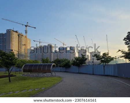Crane tower at building construction site