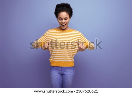 latin young woman pointing finger for having an idea