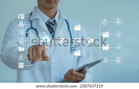  Doctor touch on virtual screens to access electronic databases and documents. Technology and access information, database, storage, Digital link tech, and big data with the assistance of AI.