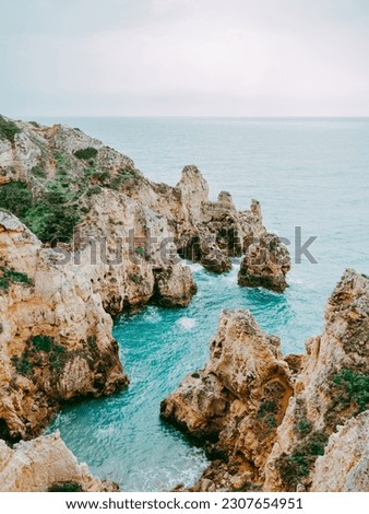 Beautiful view rocks and cliffs along the Coast of Lagos, Algarve, Portugal Royalty-Free Stock Photo #2307654951
