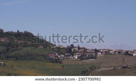 Italian landscape: The sweet hills of Pavia province, amidst cultivated and uncultivated fields. Small rural villages, farms. Vast expanses of vineyards. A special panorama for nature lovers.