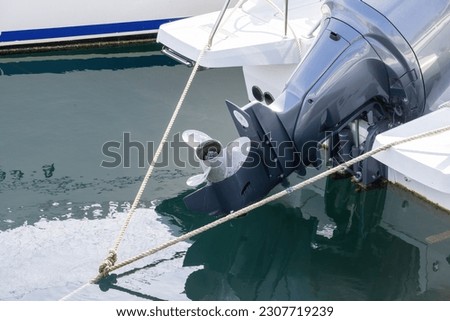 Boat with outboard motor in Saint Raphael on the Cote d'Azur, French Riviera Royalty-Free Stock Photo #2307719239
