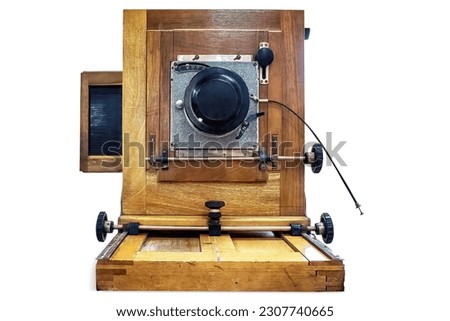 Old wooden camera on white background, isolated.