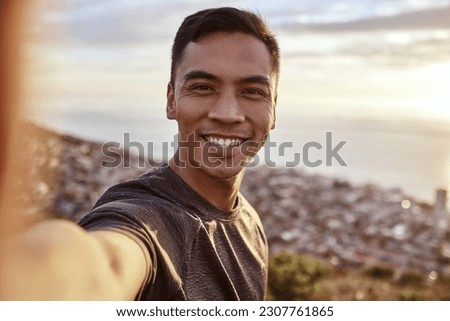 Fitness, selfie and portrait of a man on a mountain running for race, marathon or competition training. Sports, workout and happy male runner athlete taking a picture doing an outdoor cardio exercise
