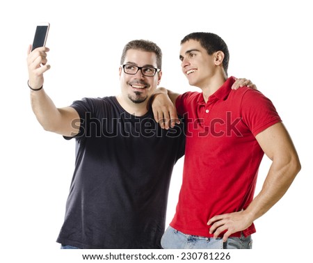 Isolated on white background two different brunette man taking selfie with smartphone camera