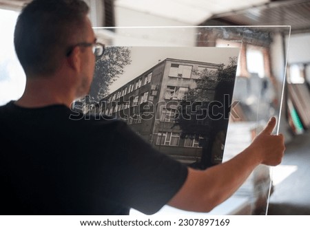 Printing house process. Wide format printing house. Close up.  Royalty-Free Stock Photo #2307897169