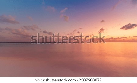 Sea sand sky closeup, sunset colors clouds horizon peaceful seascape panoramic banner. Inspirational beautiful nature, exotic travel landscape of tropical beach. Beach shore sunrise summer tranquility