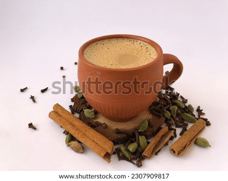 image of indian Desi kullad tea with masala. editable background Royalty-Free Stock Photo #2307909817