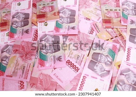 Indonesian rupiah banknotes series with the value of one hundred thousand rupiah IDR 100.000 issued since 2022, Indonesian rupiah for background Royalty-Free Stock Photo #2307941407