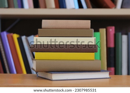 old books with a lot of different colors