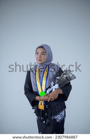 young woman photo wearing kebaya, school graduation, isolated white background, eyes not looking at the camera