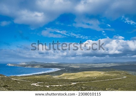 Panoramic view along the coast of Fitzgerald River National Park, south coast of Western Australia, from Mount Barren. Beautiful clouds, sweeping bay and long road
 Royalty-Free Stock Photo #2308010115